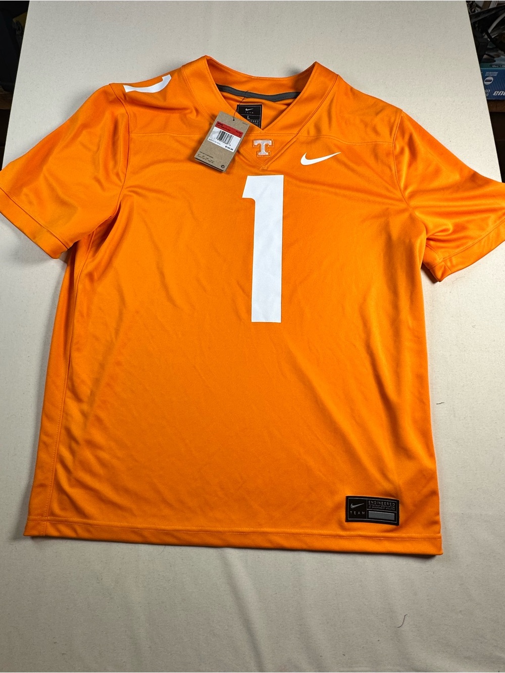 Nike Men’s Orange Football Jersey with White #1 Large